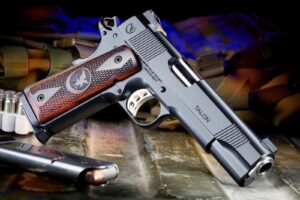 Nighthawk Custom Talon Government 1911 pistol with engraved grips