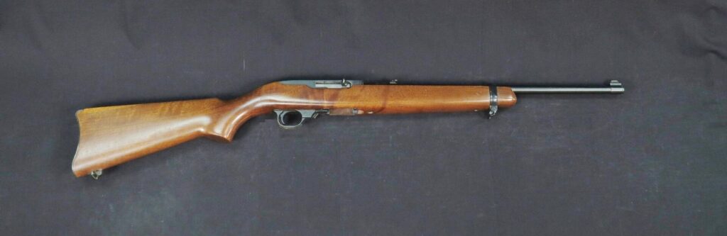 Ruger 10/22 semi-automatic .22 carbine with hardwood stock and barrel band