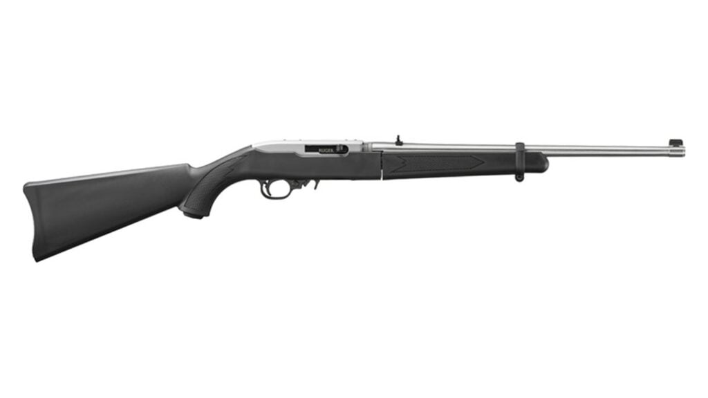 A Ruger 10/22 Takedown semi-automatic .22 LR rifle with a black synthetic stock and stainless barrel on a white background