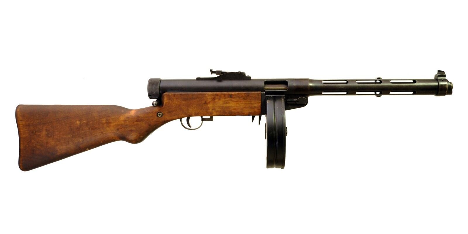 Finnish Suomi KP/-31 9mm submachine gun with a wooden stock and drum magazine