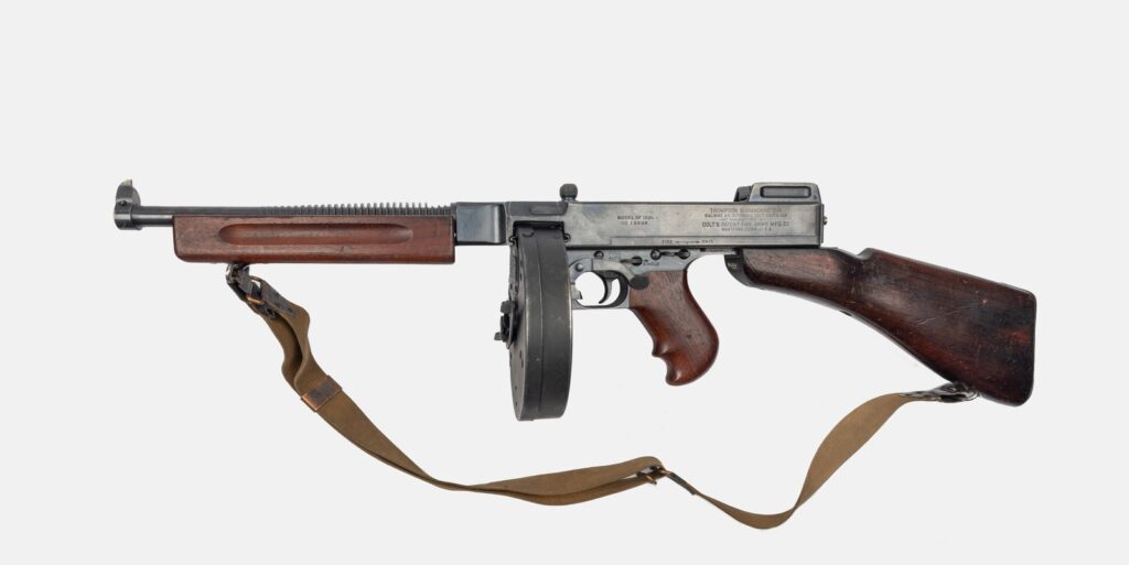 Thompson M1928 submachine gun with drum magazine and sling