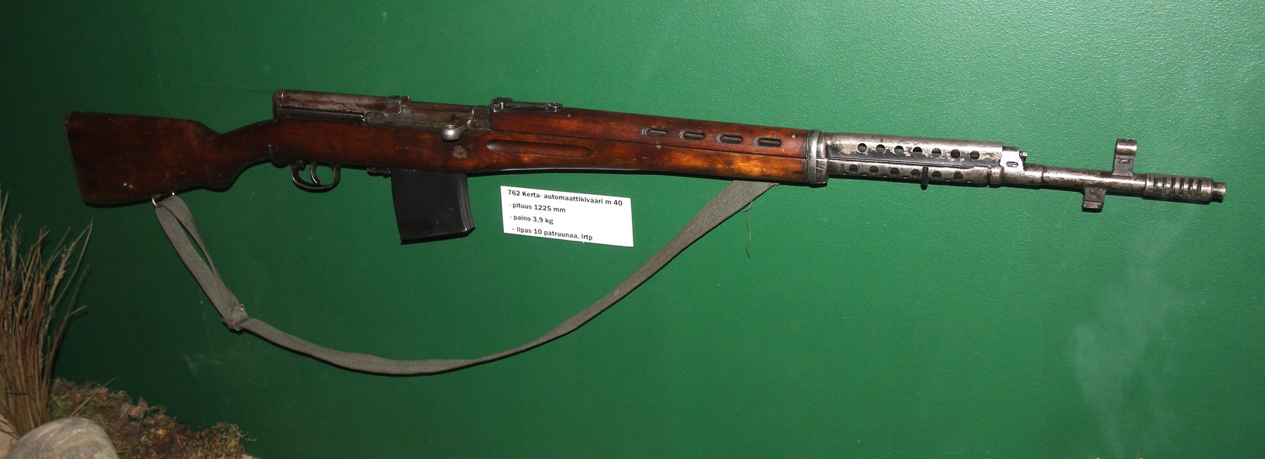 Soviet Tokarev SVT-40 semi-automatic rifle with sling on museum display
