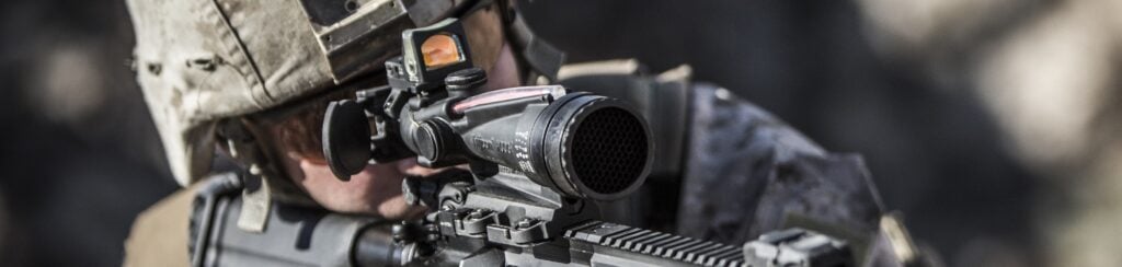 Trijicon ACOG with a Trijicon RMR mounted on top, on an M4-style carbine