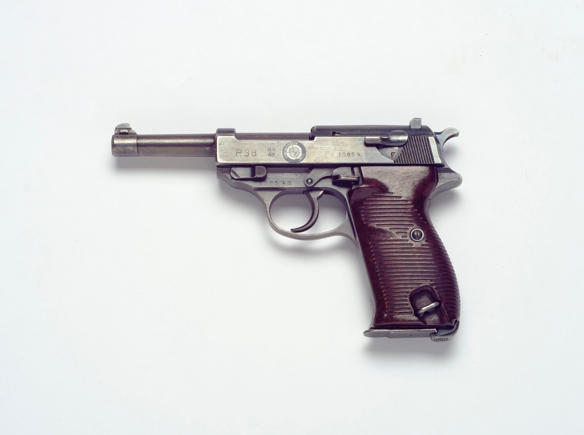Walther-made P38 marked ac 42 on the slide, left side, gray finish with reddish brown grips