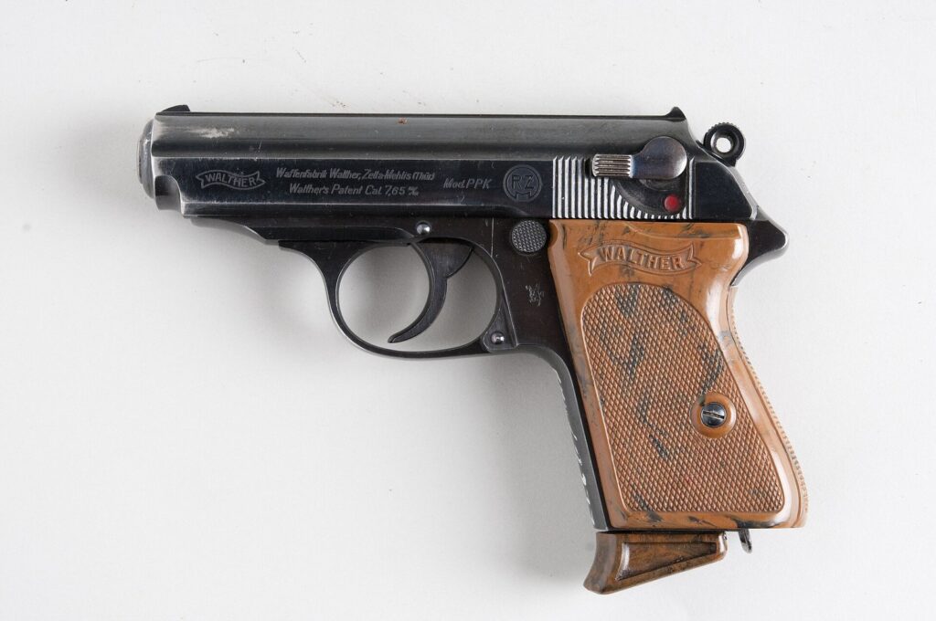 Walther PPK pistol with brown grips, left side