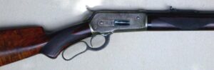 Case-colored action of a Winchester Model 1886 lever-action rifle