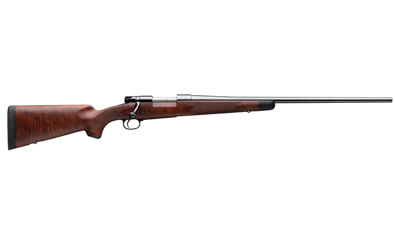 Winchester Model 70 Super Grade 7mm Remington Magnum bolt-action rifle with Grade V/VI walnut stock
