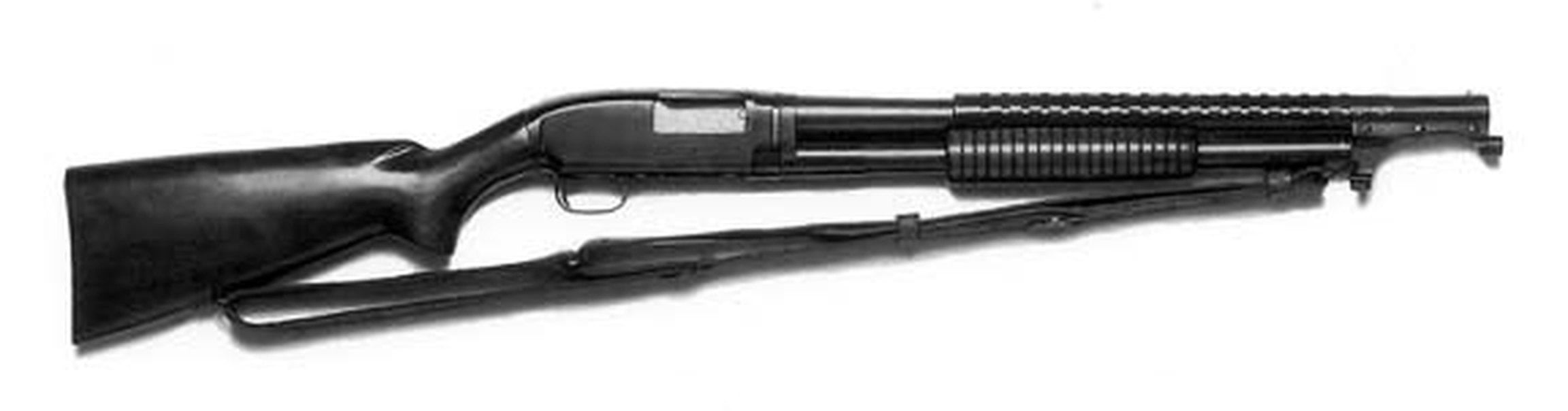 Winchester Model 12 trench gun with perforated heat shield, bayonet adapter and leather sling, from a 1957 Army manual