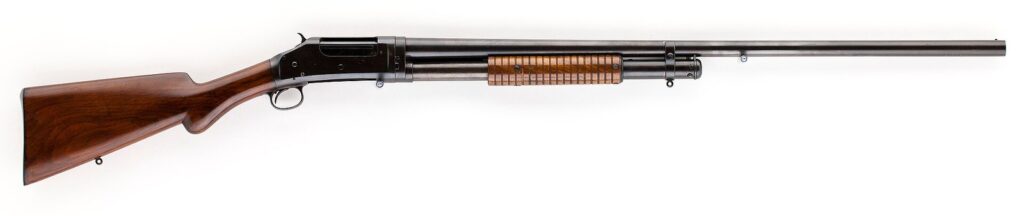 Winchester Model 1897 pump-action shotgun with exposed hammer, right side