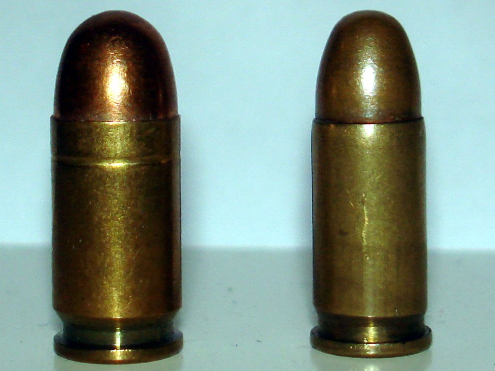 380 ACP cartridge beside a smaller 32 ACP cartridge