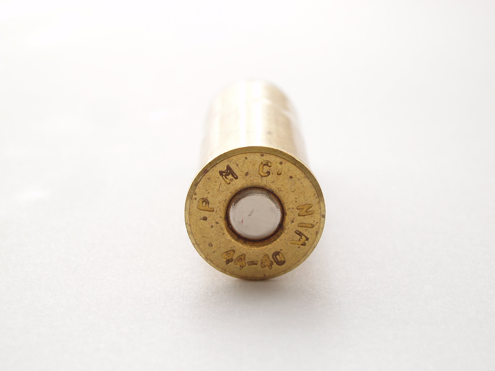 Base of a 44-40 cartridge showing a PMC 44-40 headstamp