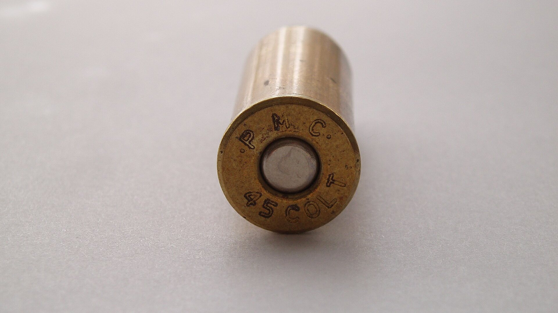 Base of a 45 Colt cartridge showing a PMC 45 Colt headstamp