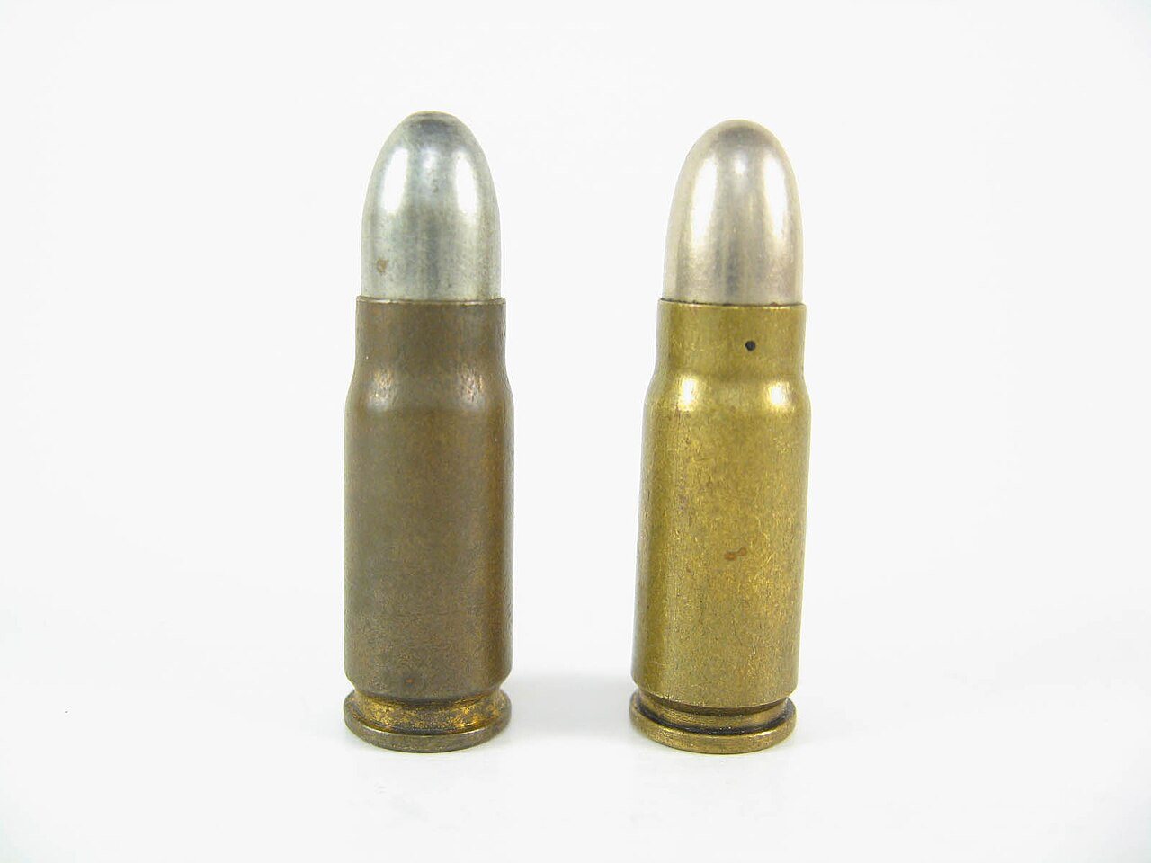 7.65 Borchardt cartridge beside a 7.63 Mauser cartridge