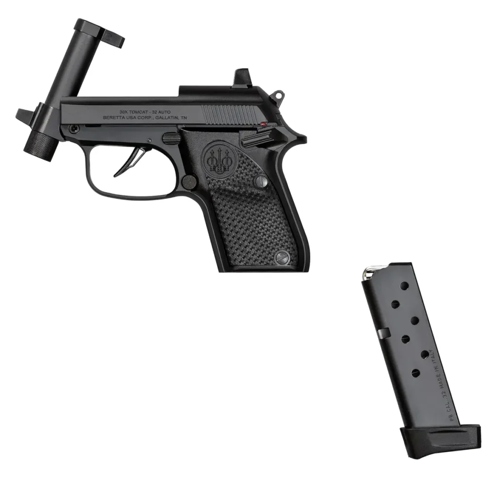 Beretta 30X Tomcat with its tip-up barrel open for loading and the 8 round magazine beside it