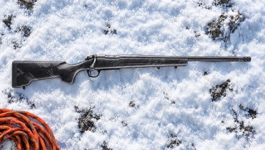 Bergara B-14 Squared Cima CF with carbon fiber sporter stock and CURE carbon barrel lying flat on packed snow