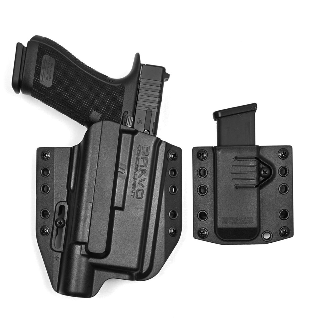 Bravo Concealment BCA 3.0 OWB holster for a Glock 19 with a SureFire X300 and a magazine pouch
