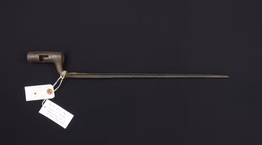 Original Brown Bess socket bayonet with museum tags, Smithsonian collection