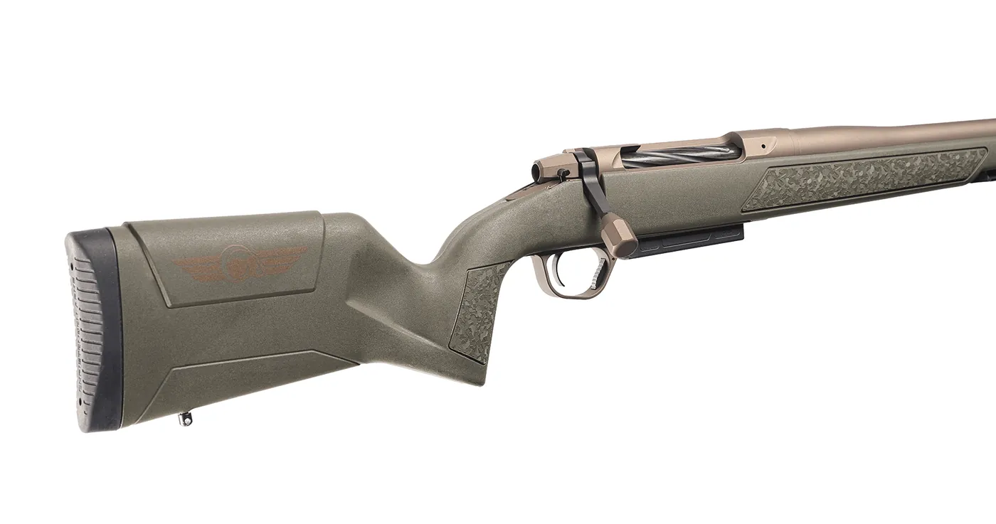 Rear three-quarter view of a Christensen Arms Evoke showing the OD Green polymer stock with the Christensen logo, the spiral fluted bolt, the faceted bolt knob and the Smoked Bronze receiver, Christensen Arms photo