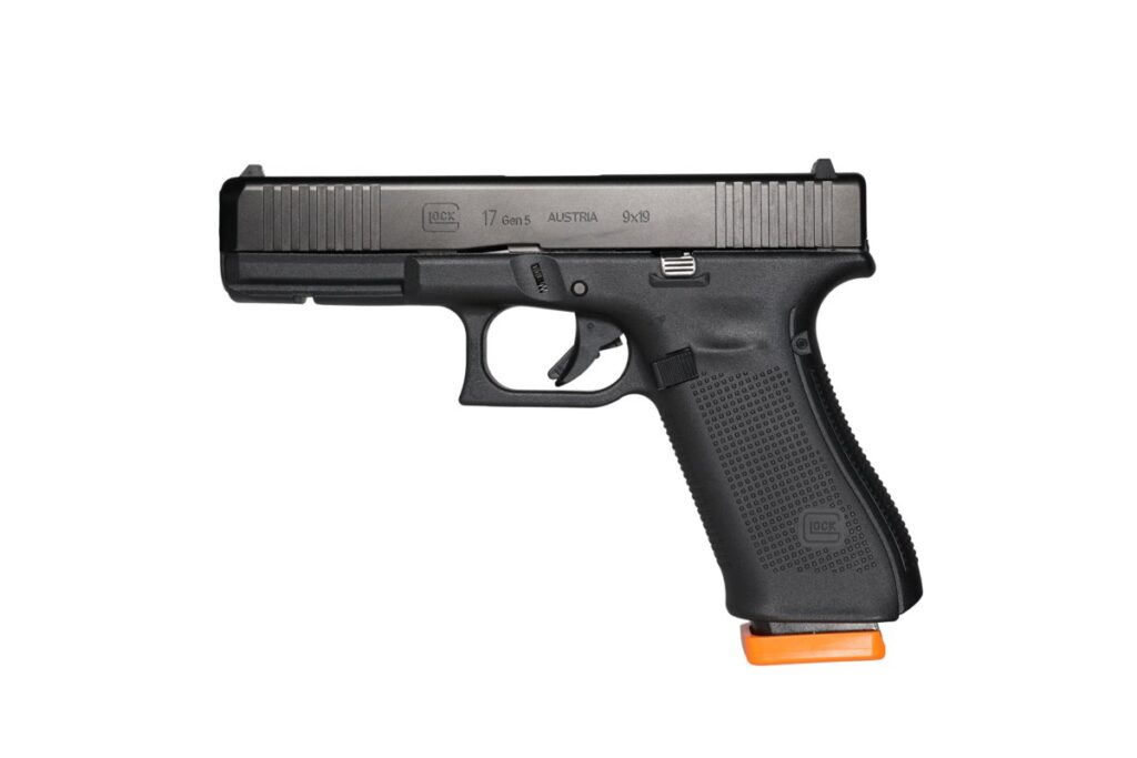 Glock 17 with a DryFireMag training magazine and orange baseplate