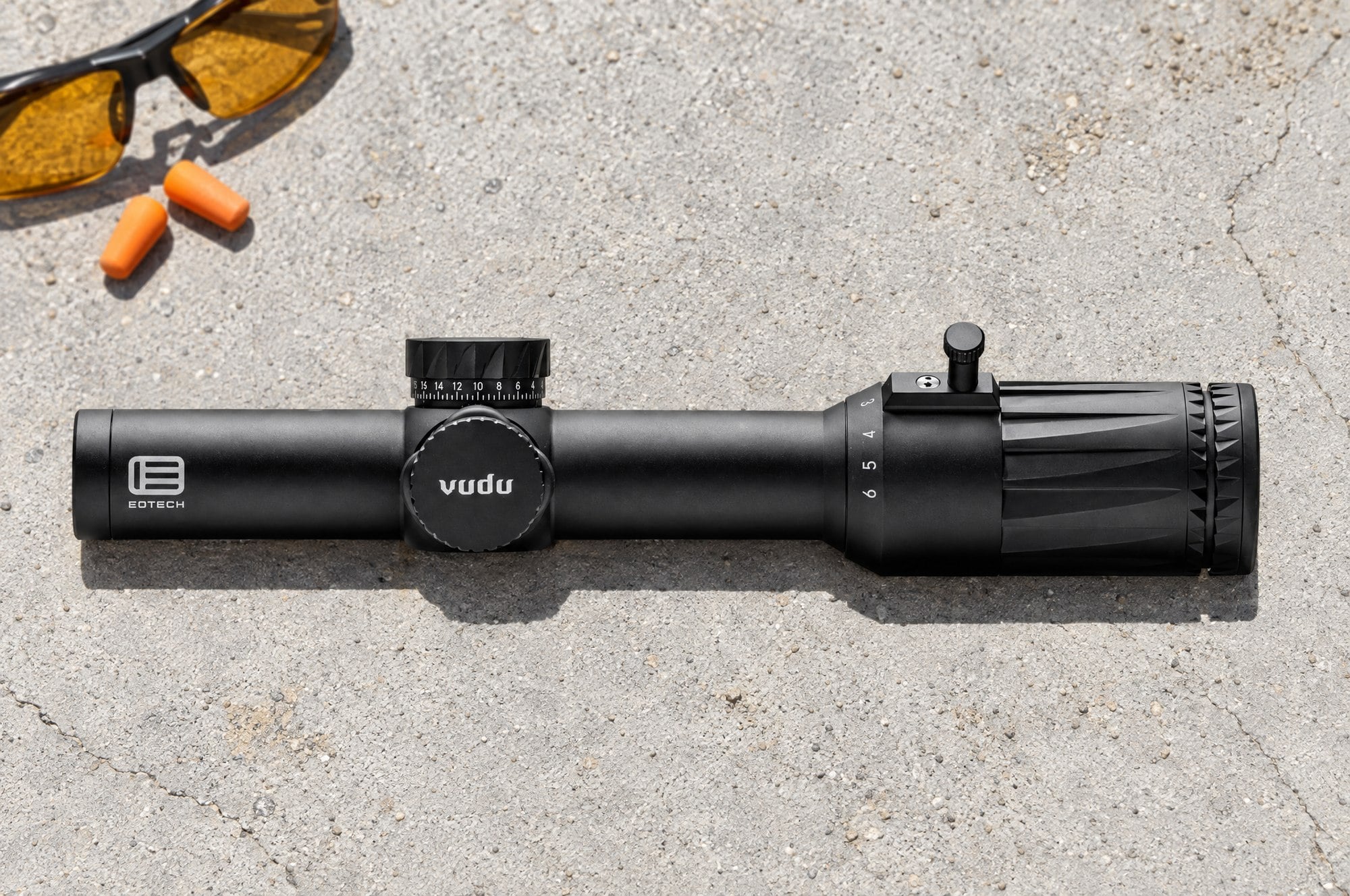 EOTech Vudu 1-6 power first focal plane rifle scope lying on a concrete shooting bench