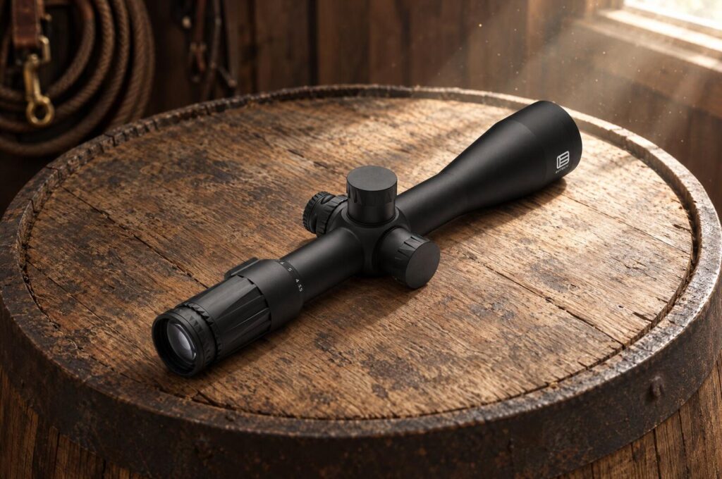 EOTech Vudu 3.5-18x50 SFP riflescope lying on the oak lid of an old barrel in a ranch tack room