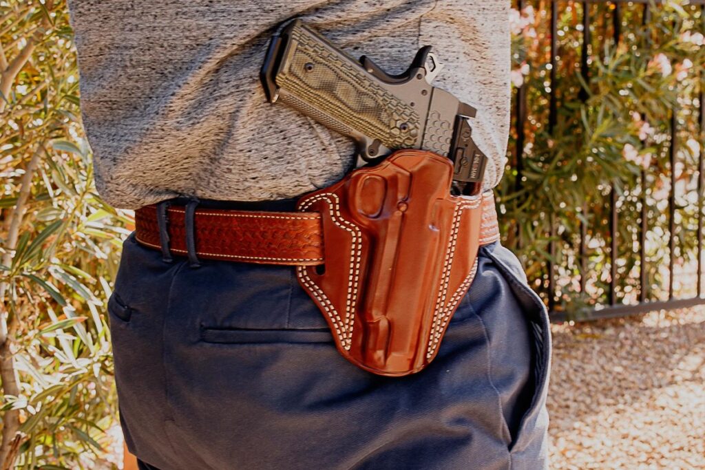 Galco Combat Master 2.0 leather pancake holster carrying a 1911 with a red dot on a belt