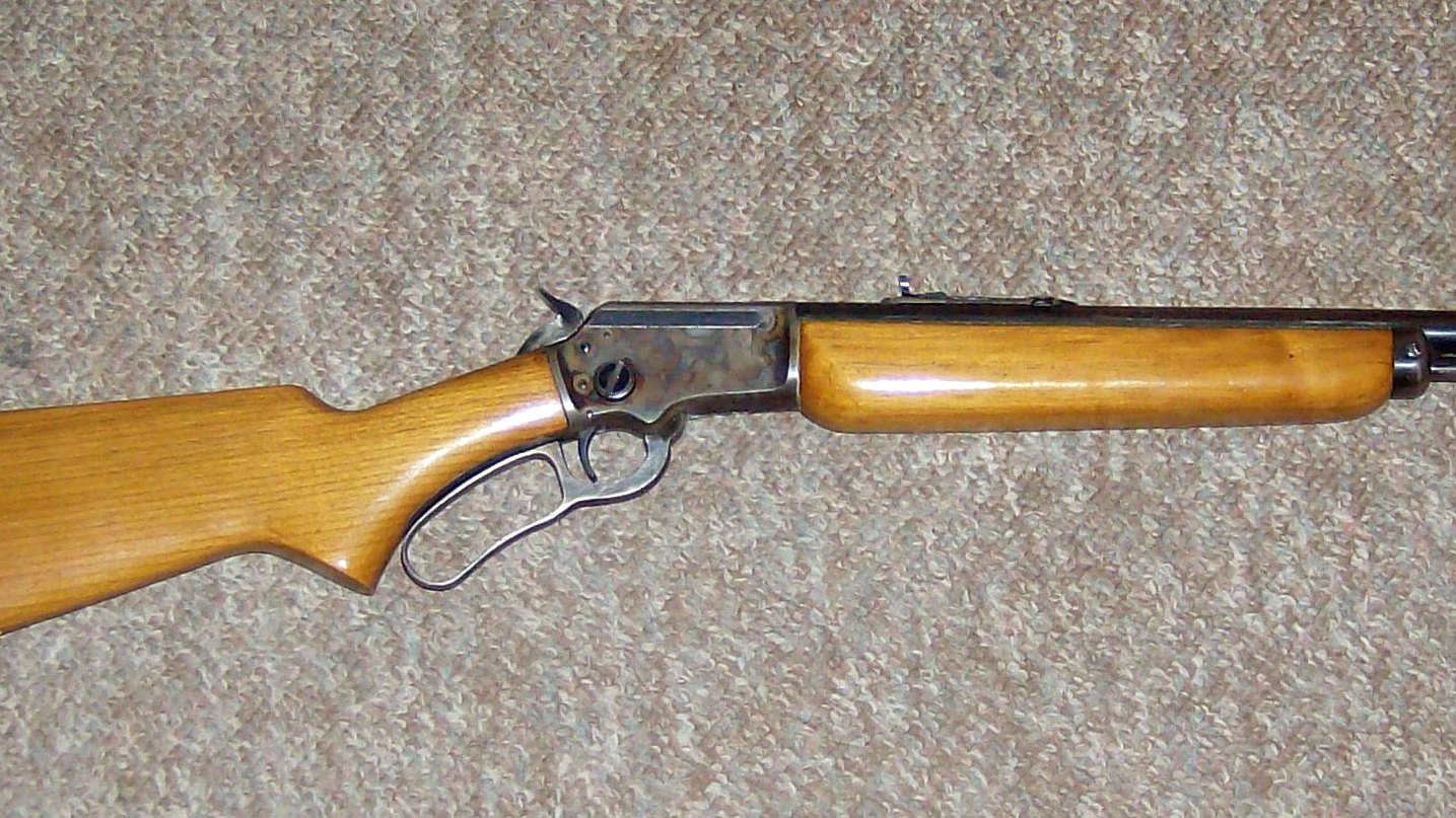Early Marlin Model 39A .22 lever-action rifle showing the side ejection port, takedown screw and pistol-grip stock