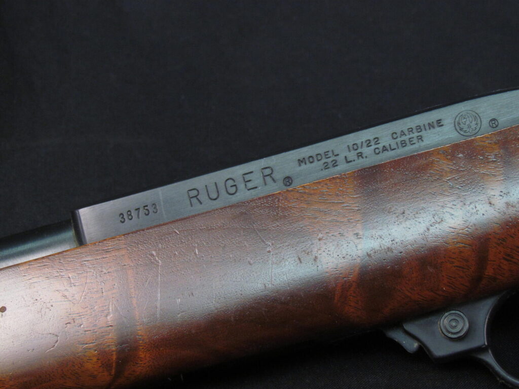 Left side of an early Ruger 10/22 Carbine receiver showing serial number 38753 stamped ahead of the Ruger name