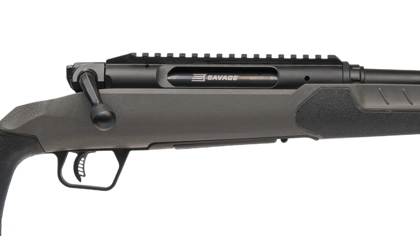 Close-up of the Savage Impulse straight-pull action on the Core Hunter showing the integral rail, Savage logo bolt window, ambidextrous bolt handle and AccuTrigger, Savage photo