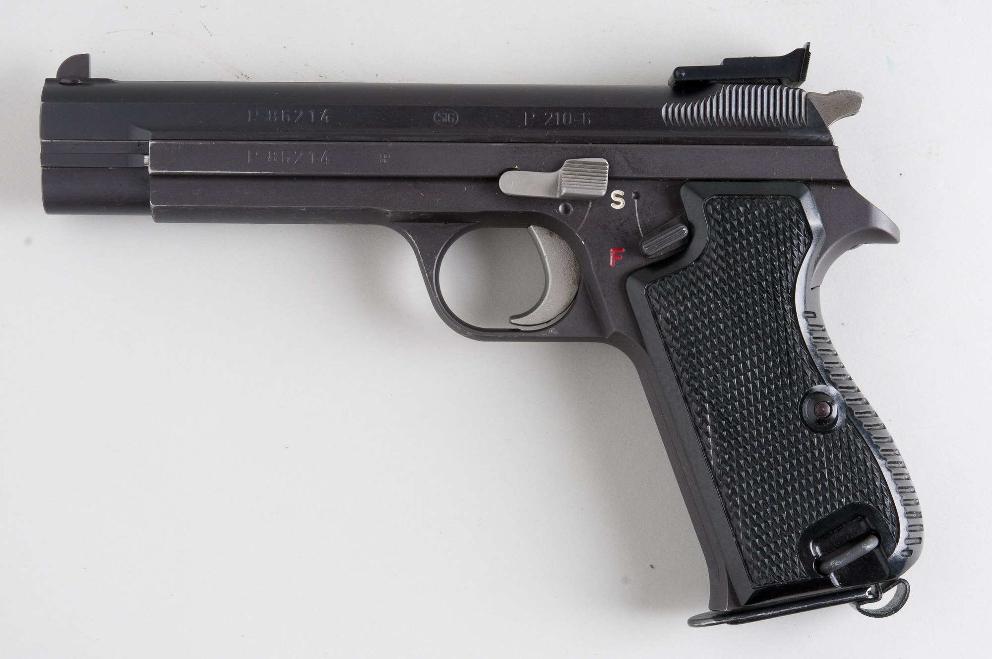 SIG P210-6 pistol with target rear sight and wood grips, left side