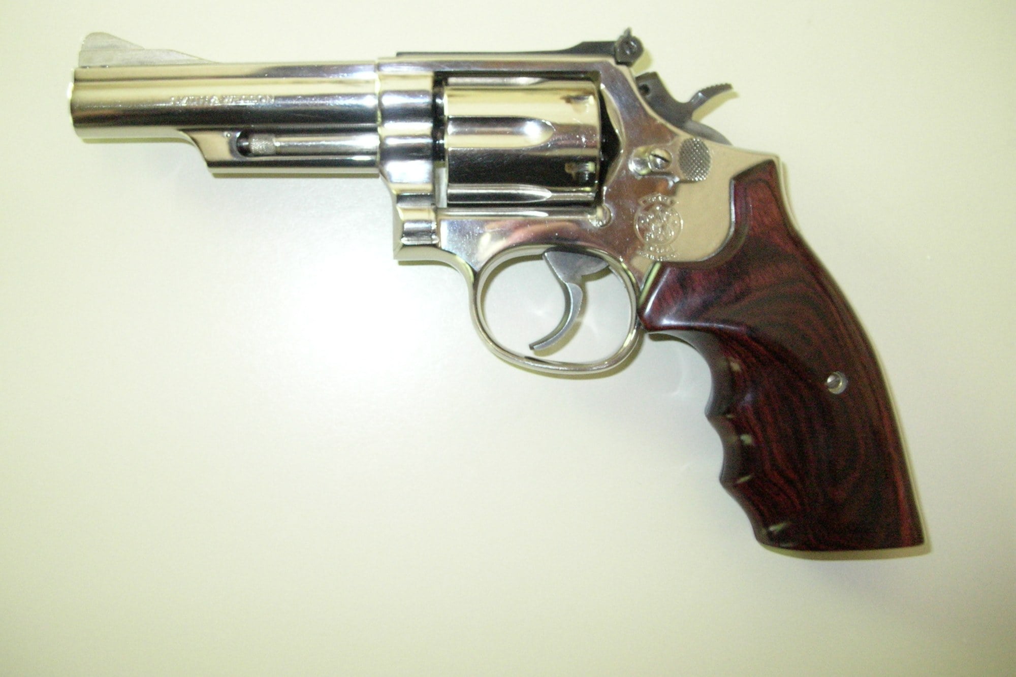 Smith & Wesson Model 19 Combat Magnum .357 revolver with 4-inch barrel in nickel finish, left side