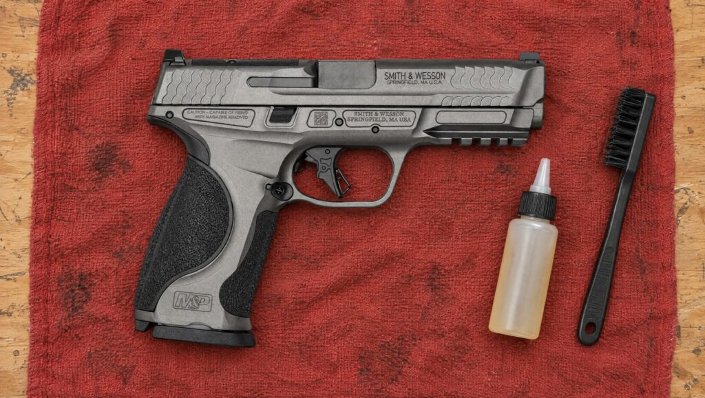 Smith & Wesson M&P40 M2.0 Metal pistol in .40 S&W with Tungsten Gray frame lying flat on a red shop towel