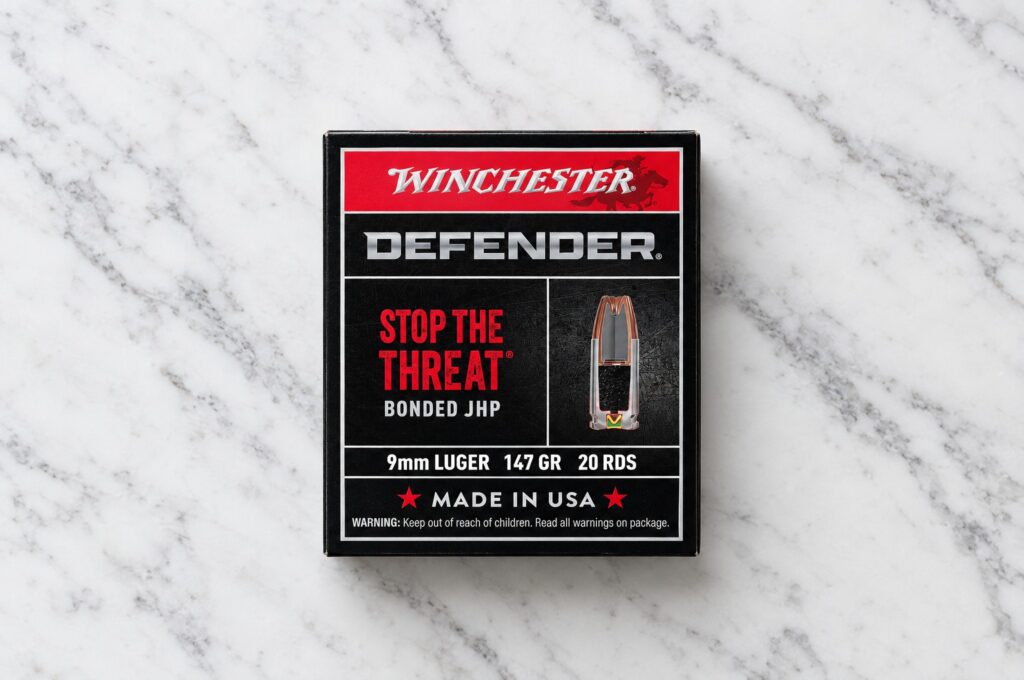 Winchester Defender S9MMPDB1 9mm Luger 147 grain bonded JHP box lying on a white marble counter