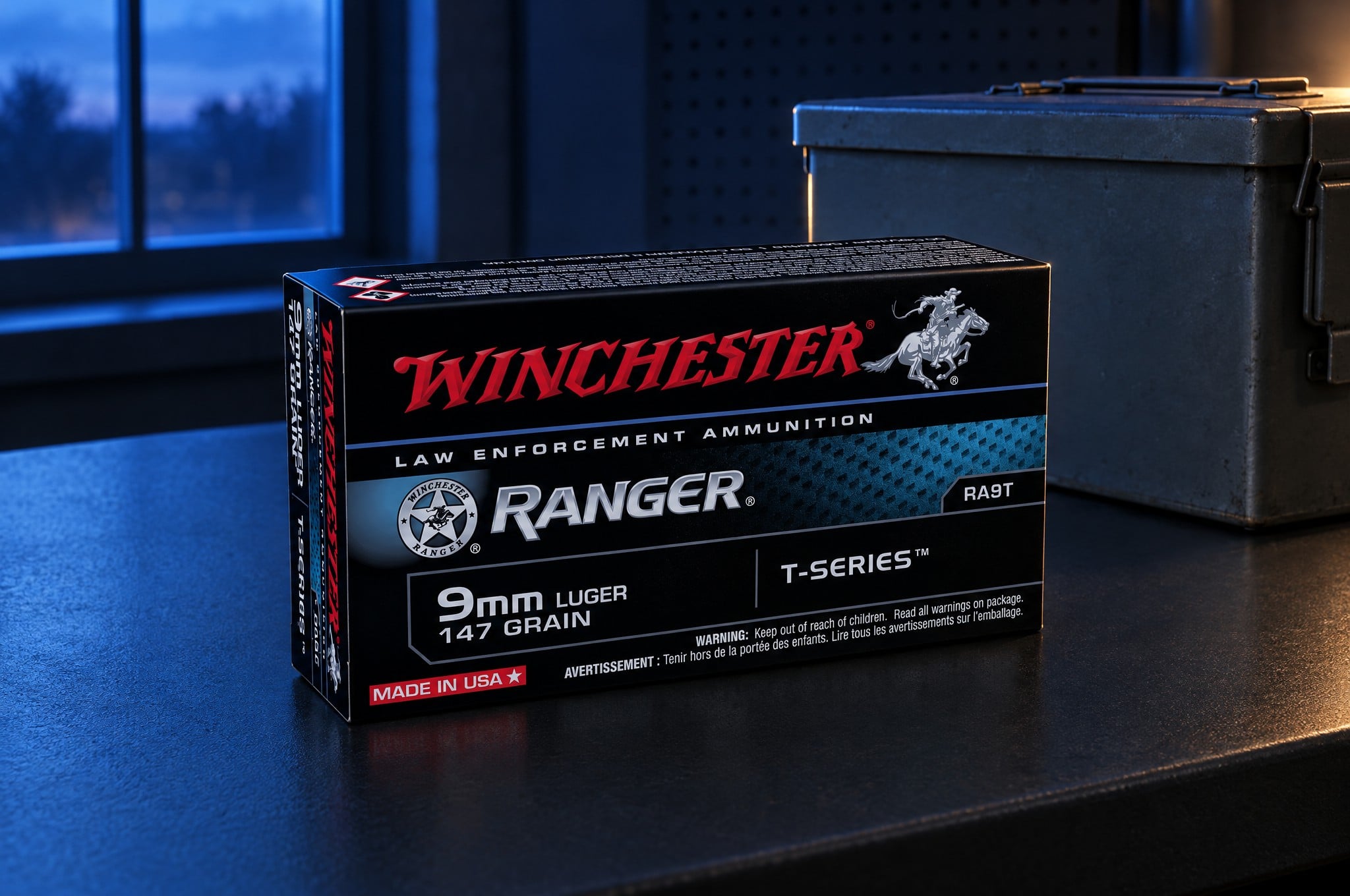 Winchester Ranger T-Series review: RA9T 9mm Luger 147 grain law enforcement box on a black steel bench beside an ammo can at blue hour