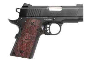 How to Choose Your First Handgun: Complete Buyer's Guide (2026) 43 Colt Defender 9mm Semi-Auto Pistol with Black Cherry Grips